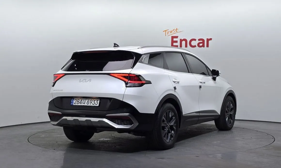 Kia Sportage — фото 8