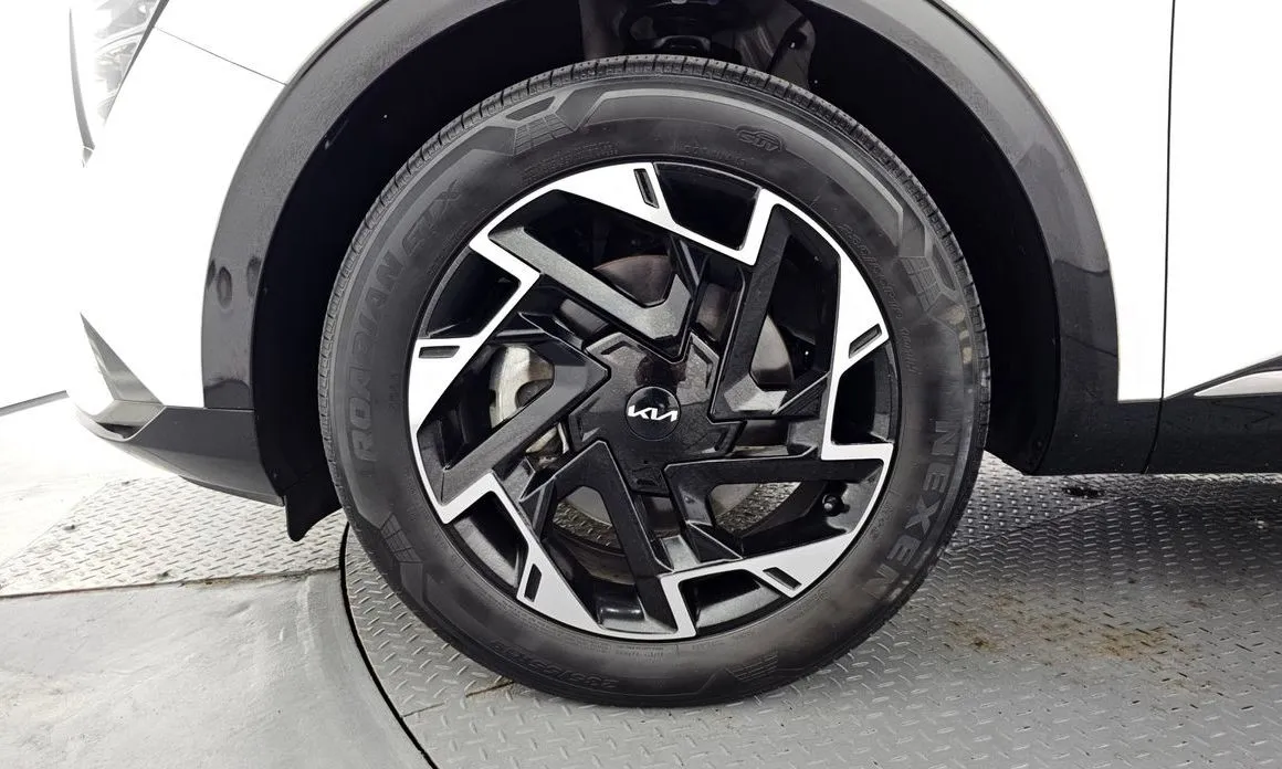 Kia Sportage — фото 10