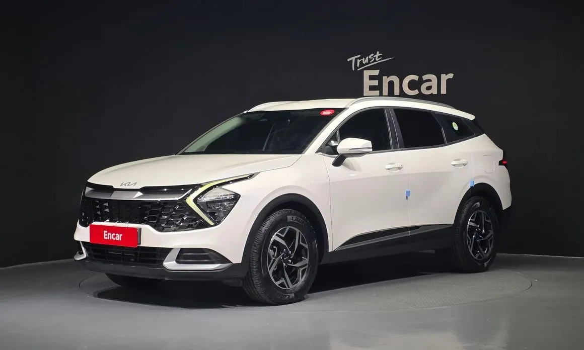 Kia Sportage — фото 1