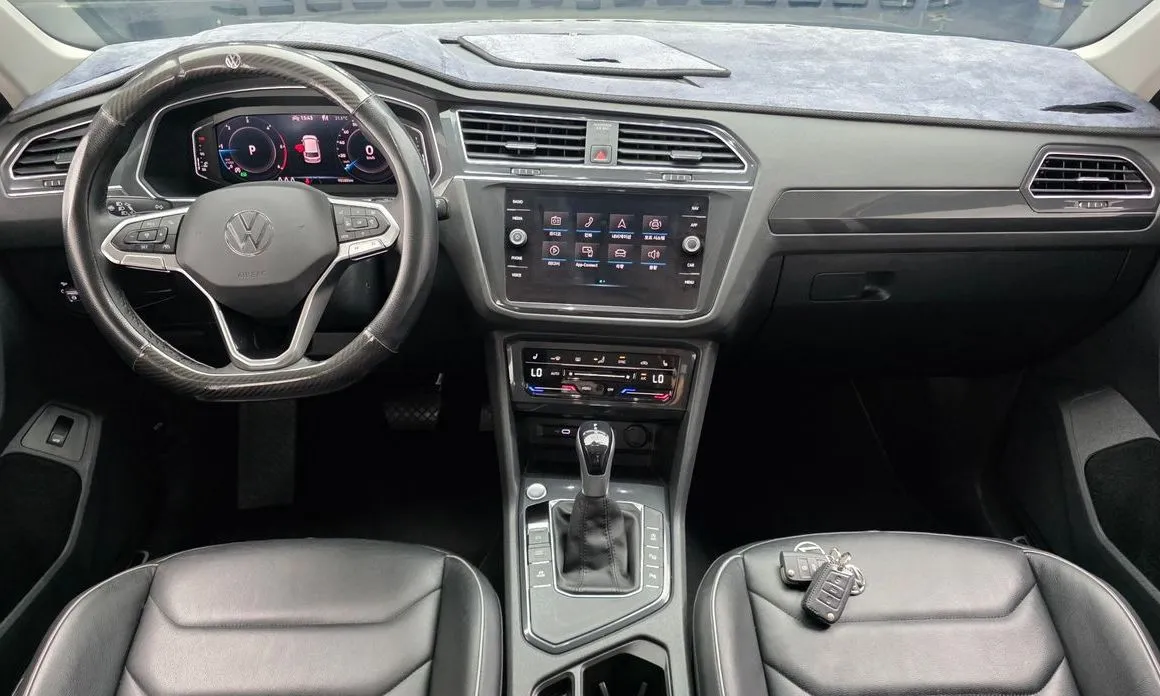 Volkswagen Tiguan — фото 9
