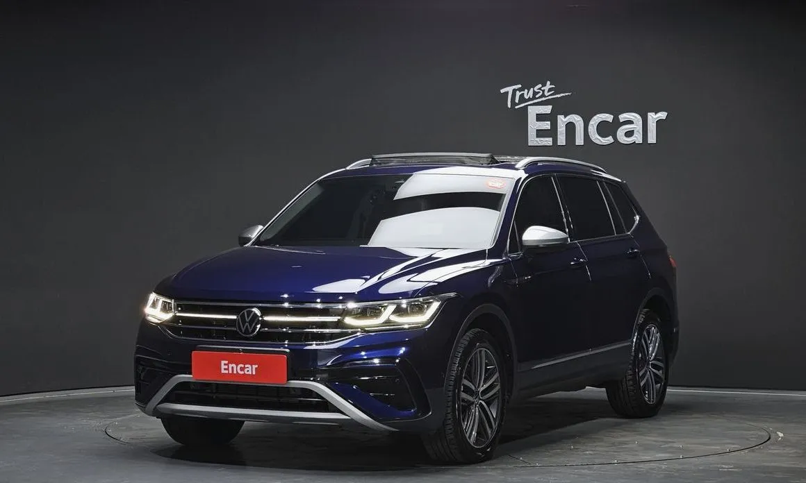 Volkswagen Tiguan — фото 1