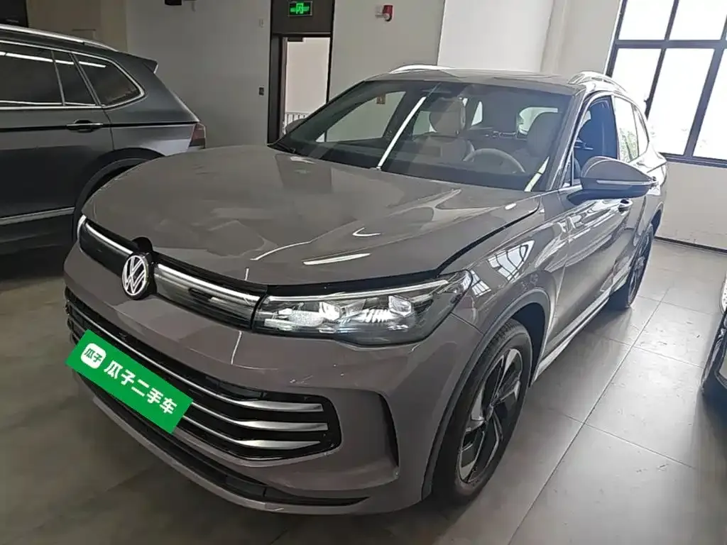 Volkswagen Tiguan L — фото 7