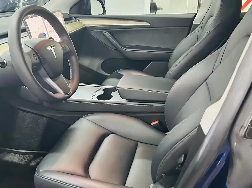 Tesla Model Y — фото 6