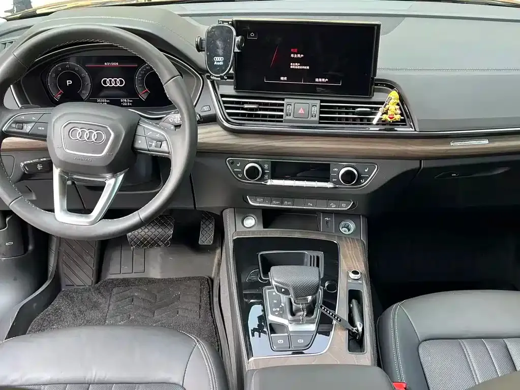 Audi Q5L — фото 9