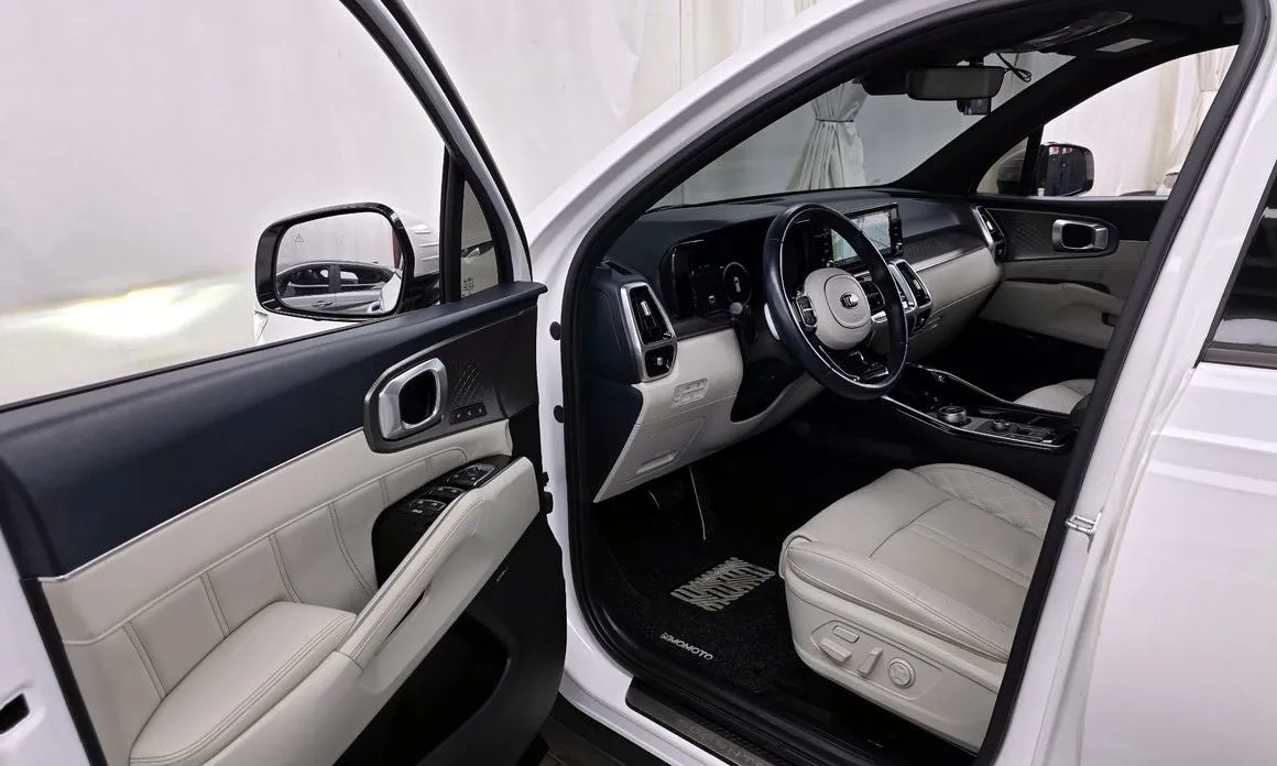 Kia Sorento — фото 7