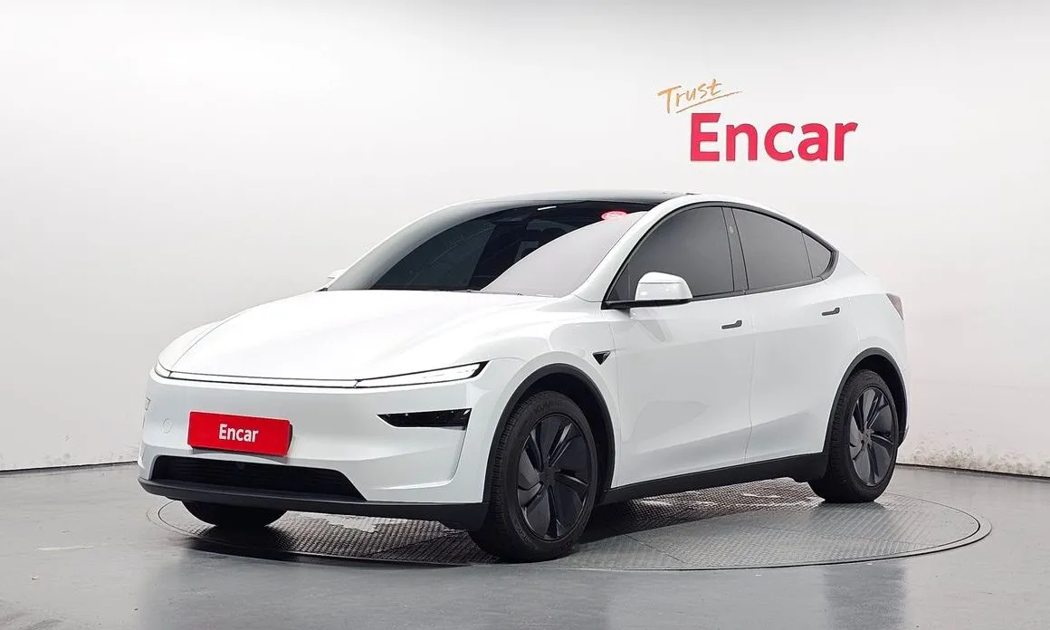Tesla Model Y — фото 1