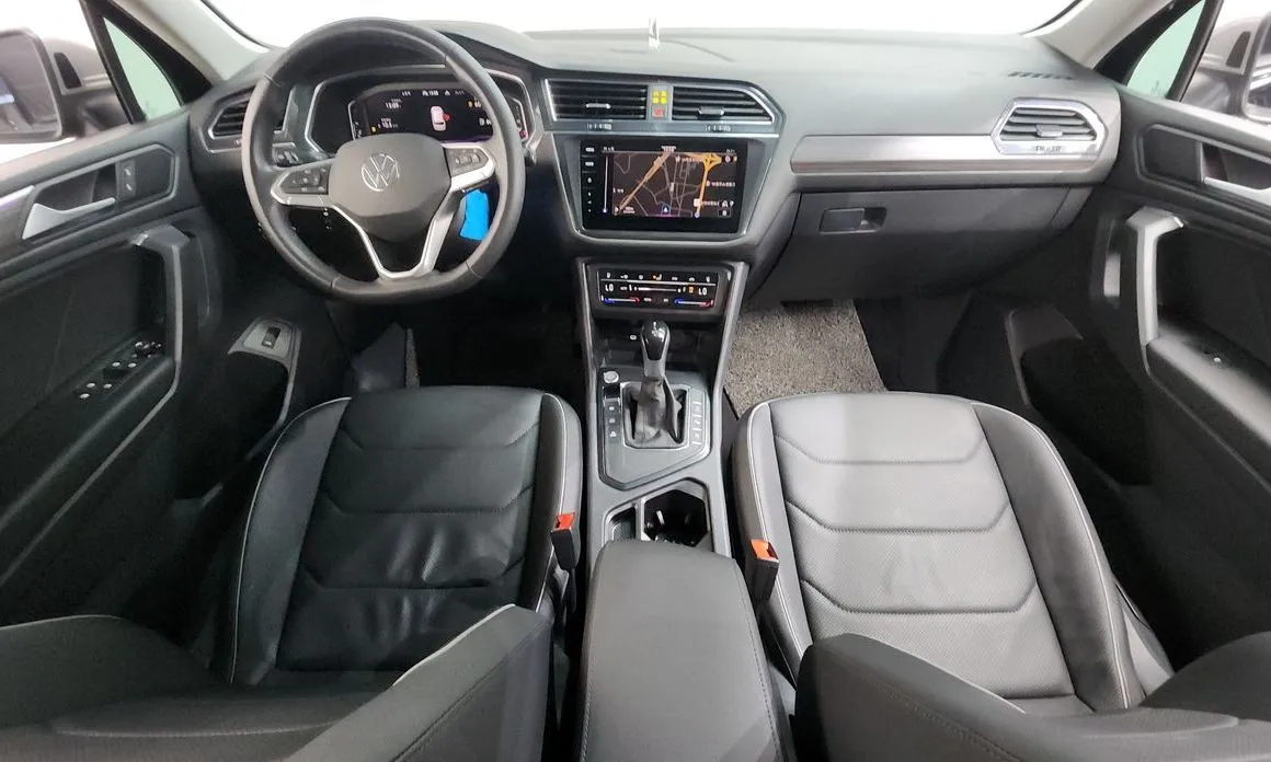 Volkswagen Tiguan — фото 9