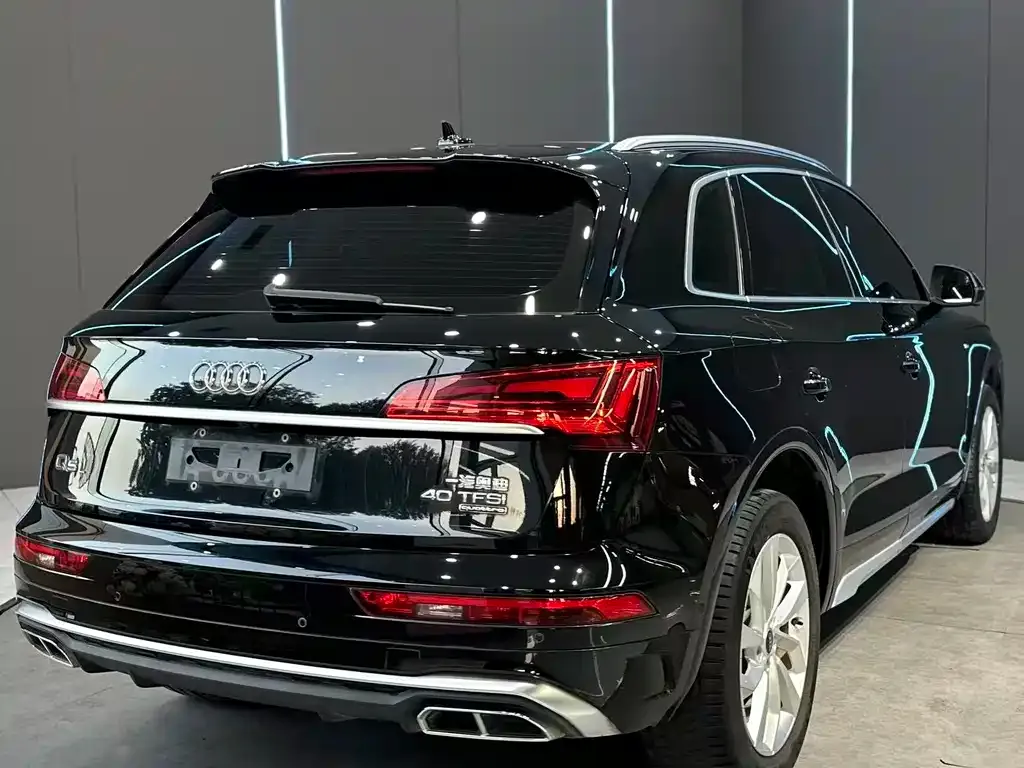 Audi Q5L — фото 8