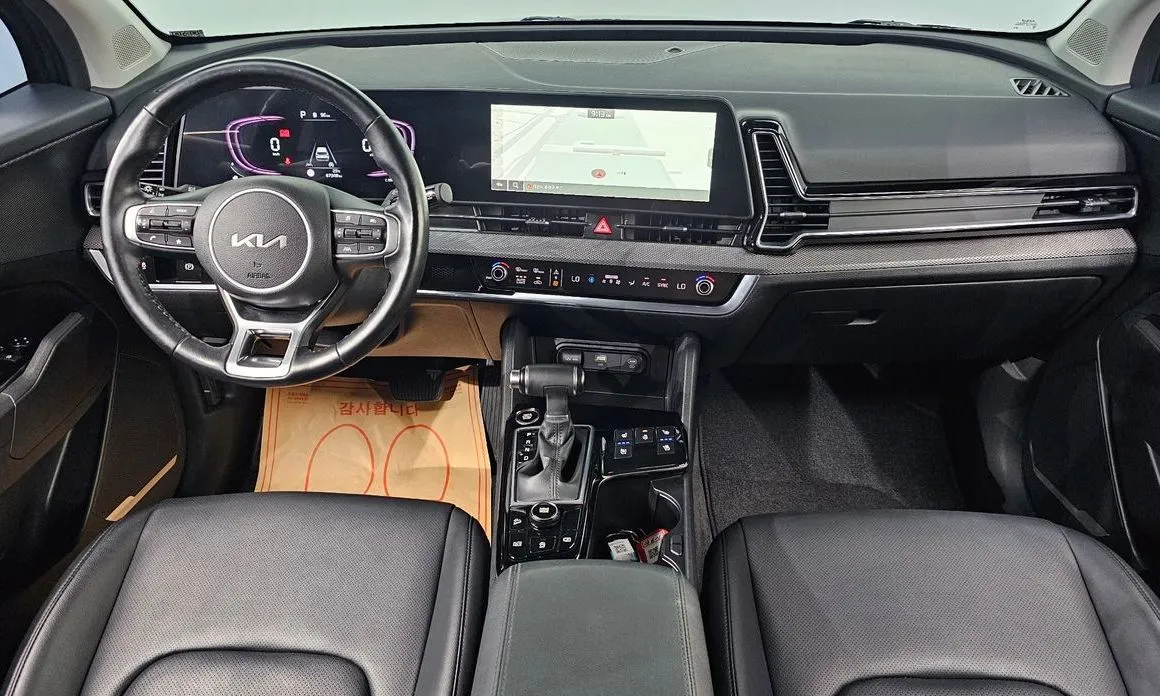 Kia Sportage — фото 10