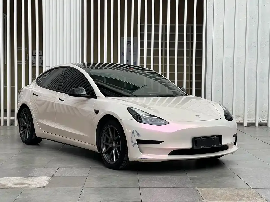 Tesla Model 3 — фото 9
