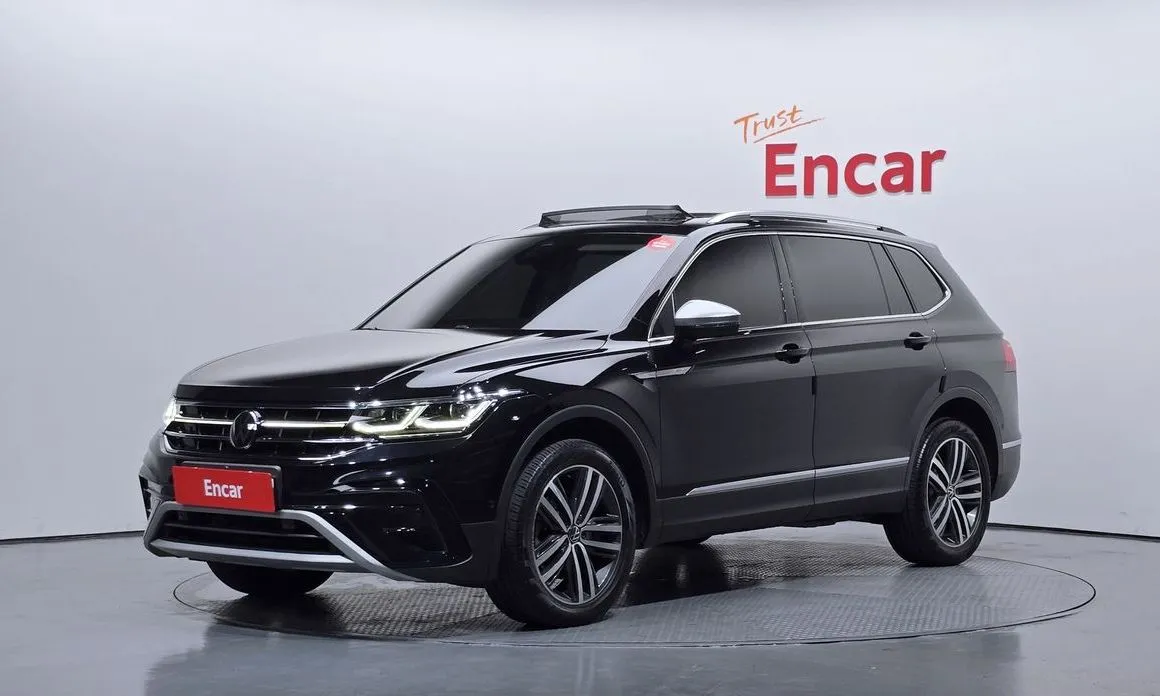 Volkswagen Tiguan — фото 1