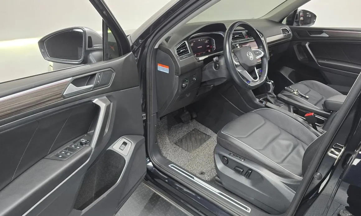 Volkswagen Tiguan — фото 8
