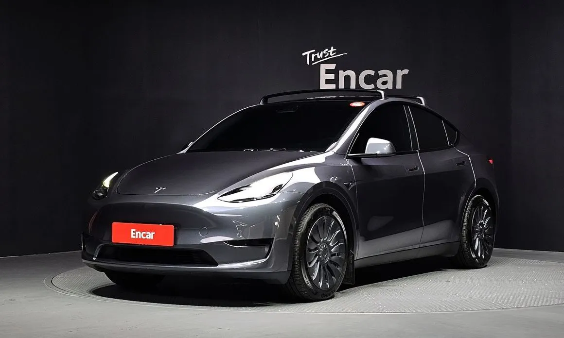 Tesla Model Y — фото 1