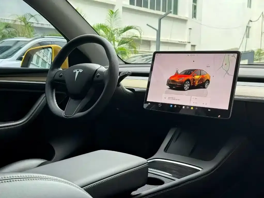 Tesla Model Y — фото 6