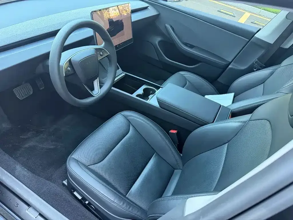 Tesla Model 3 — фото 7
