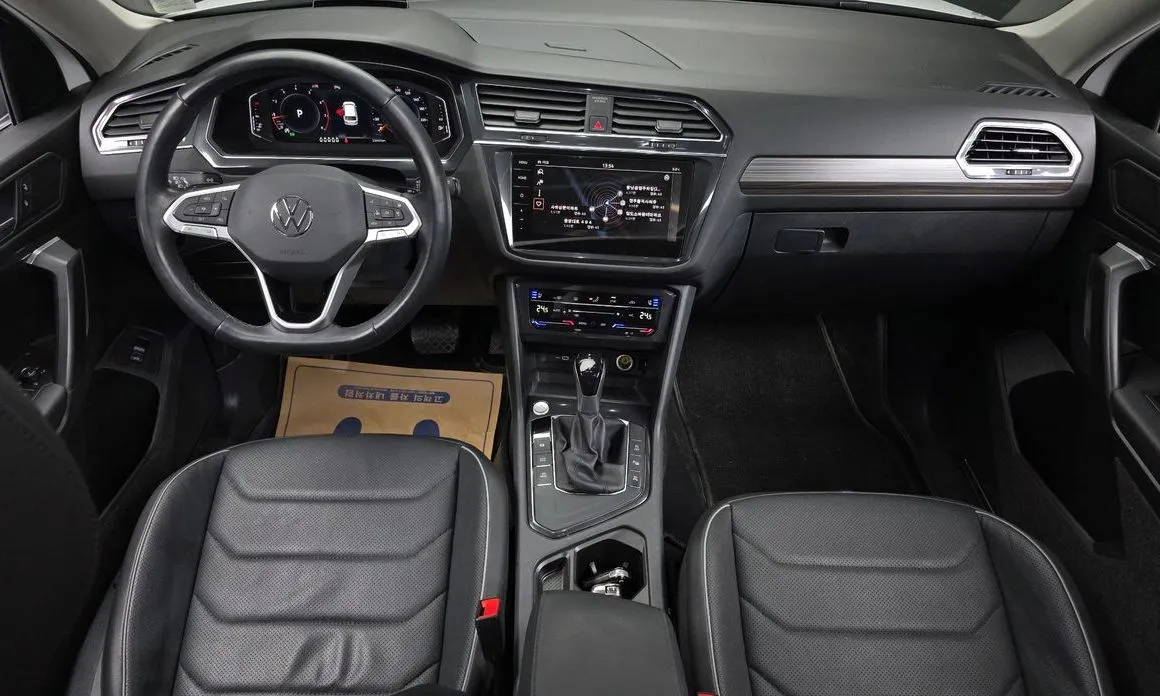 Volkswagen Tiguan — фото 9