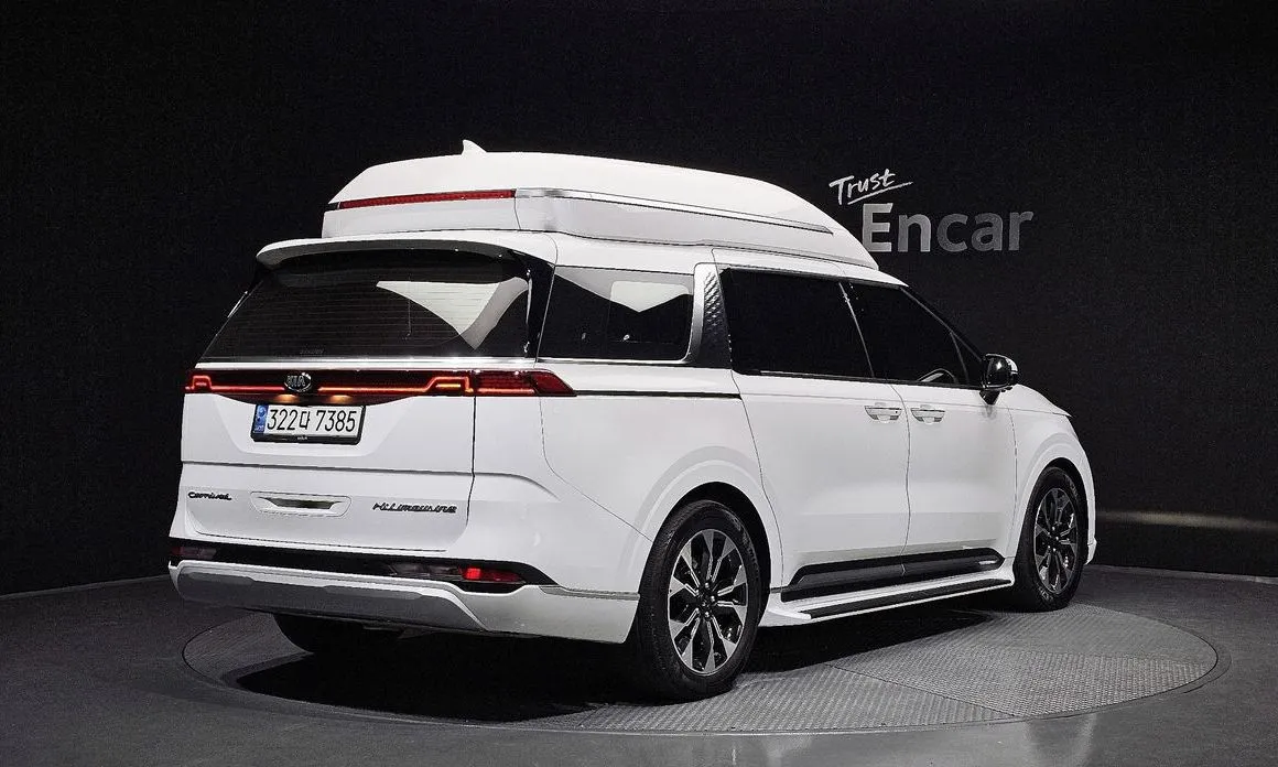 Kia Carnival — фото 10