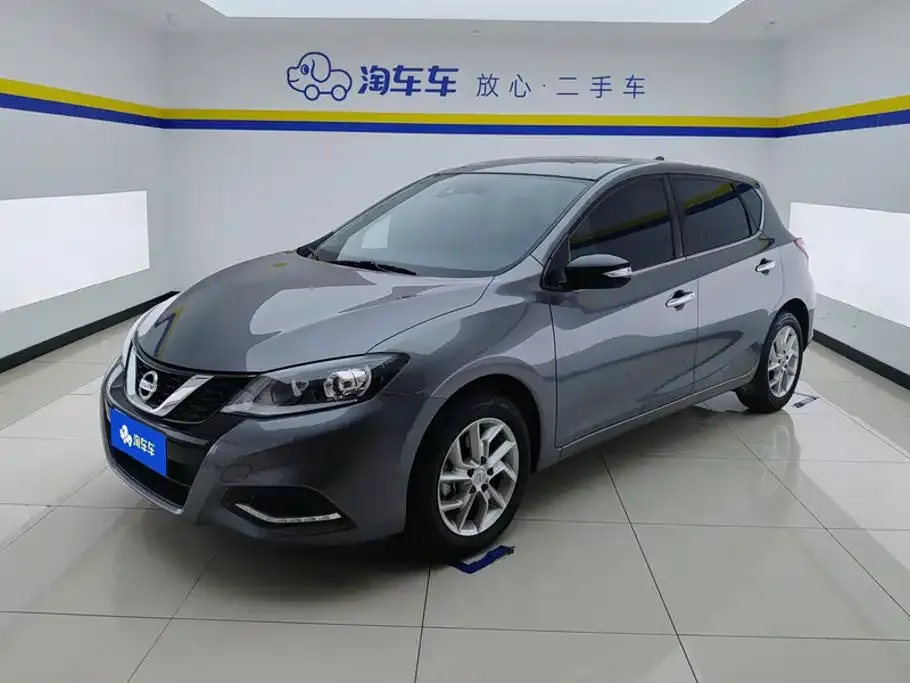 Nissan Tiida — фото 1