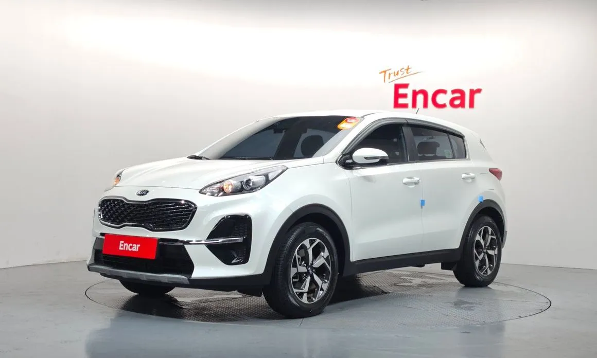Kia Sportage — фото 1