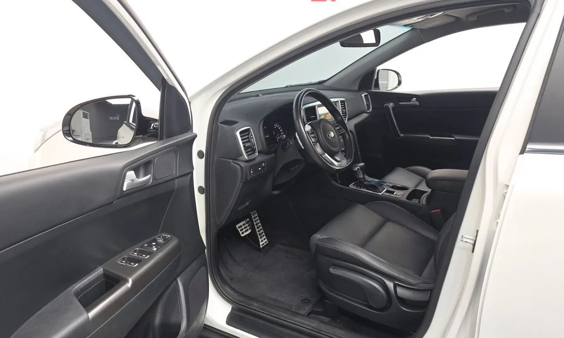 Kia Sportage — фото 9