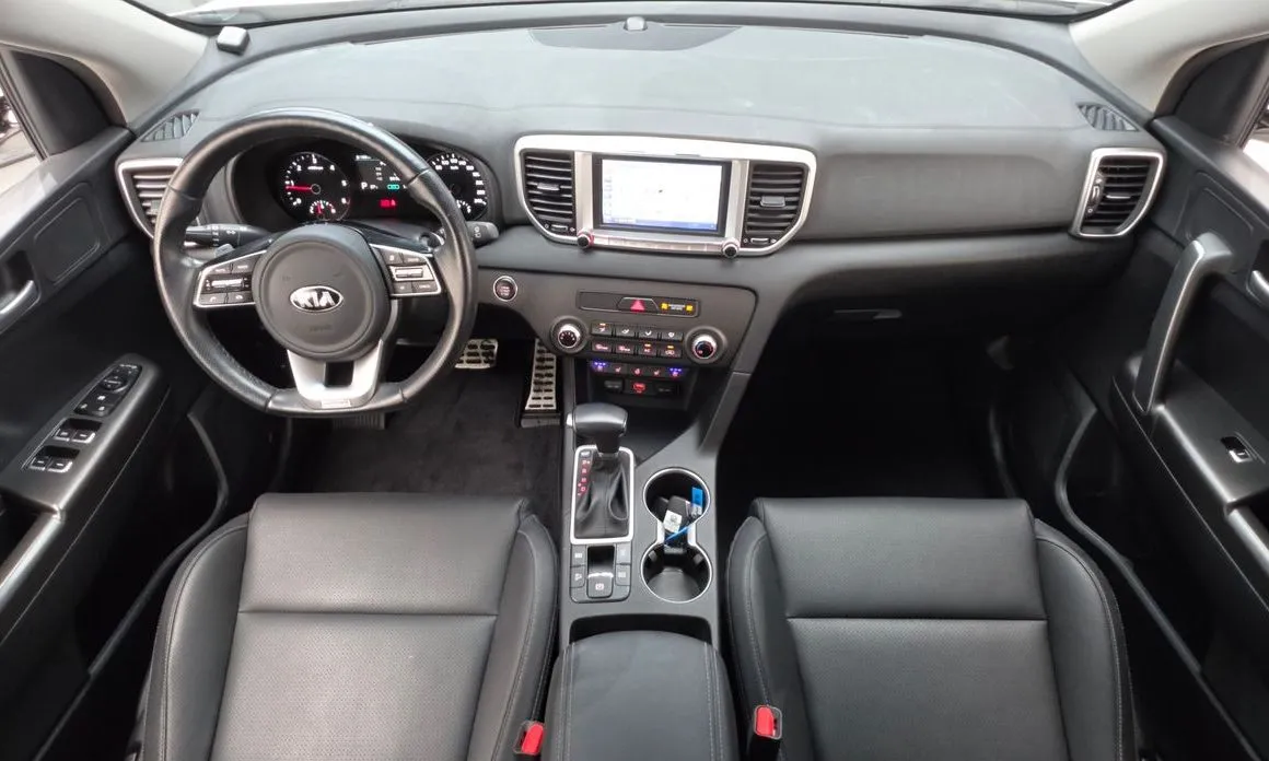 Kia Sportage — фото 10