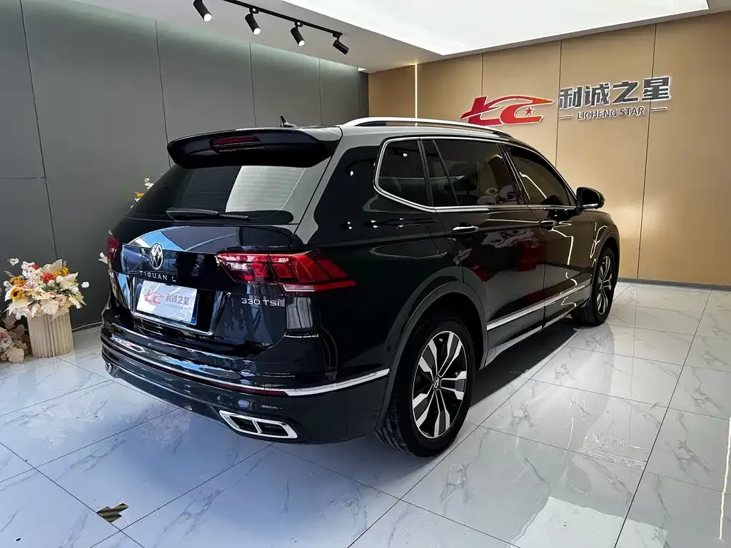 Volkswagen Tiguan L — фото 10