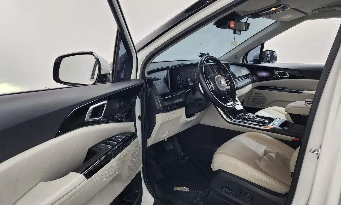 Kia Carnival — фото 10