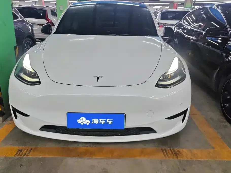 Tesla Model Y — фото 8