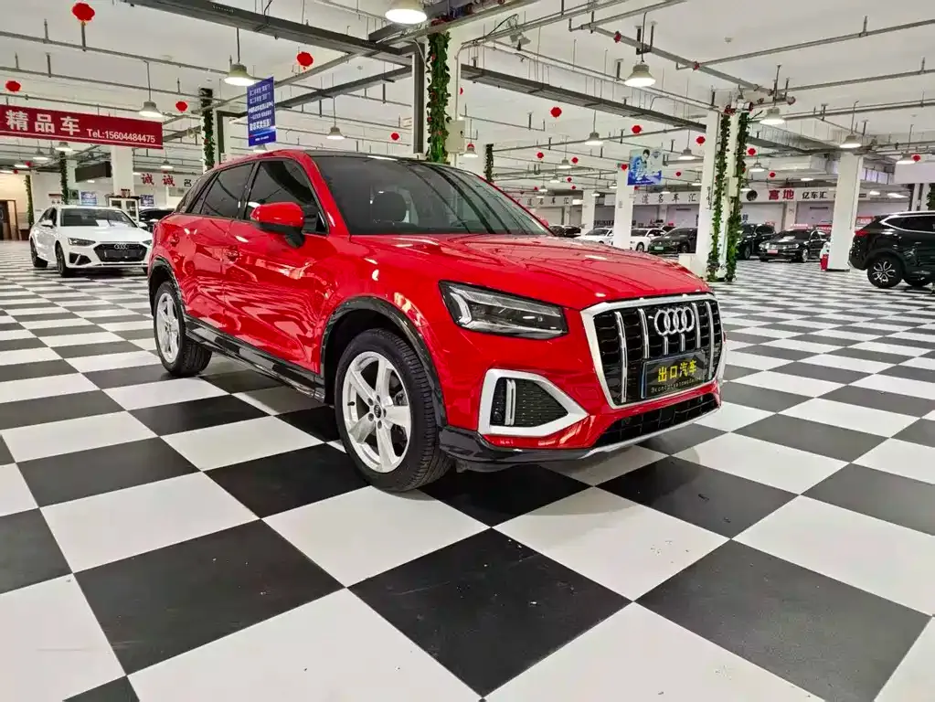 Audi Q2L — фото 10