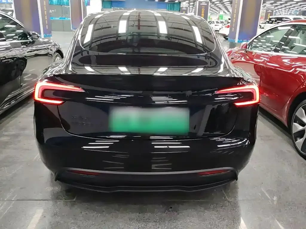 Tesla Model 3 — фото 9