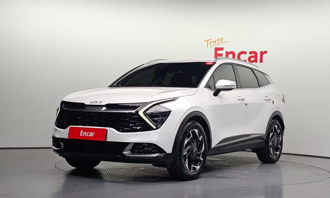 Kia Sportage — фото 1