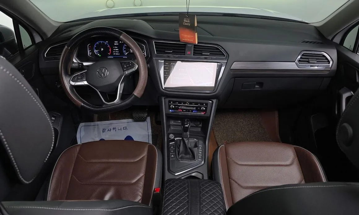 Volkswagen Tiguan — фото 10