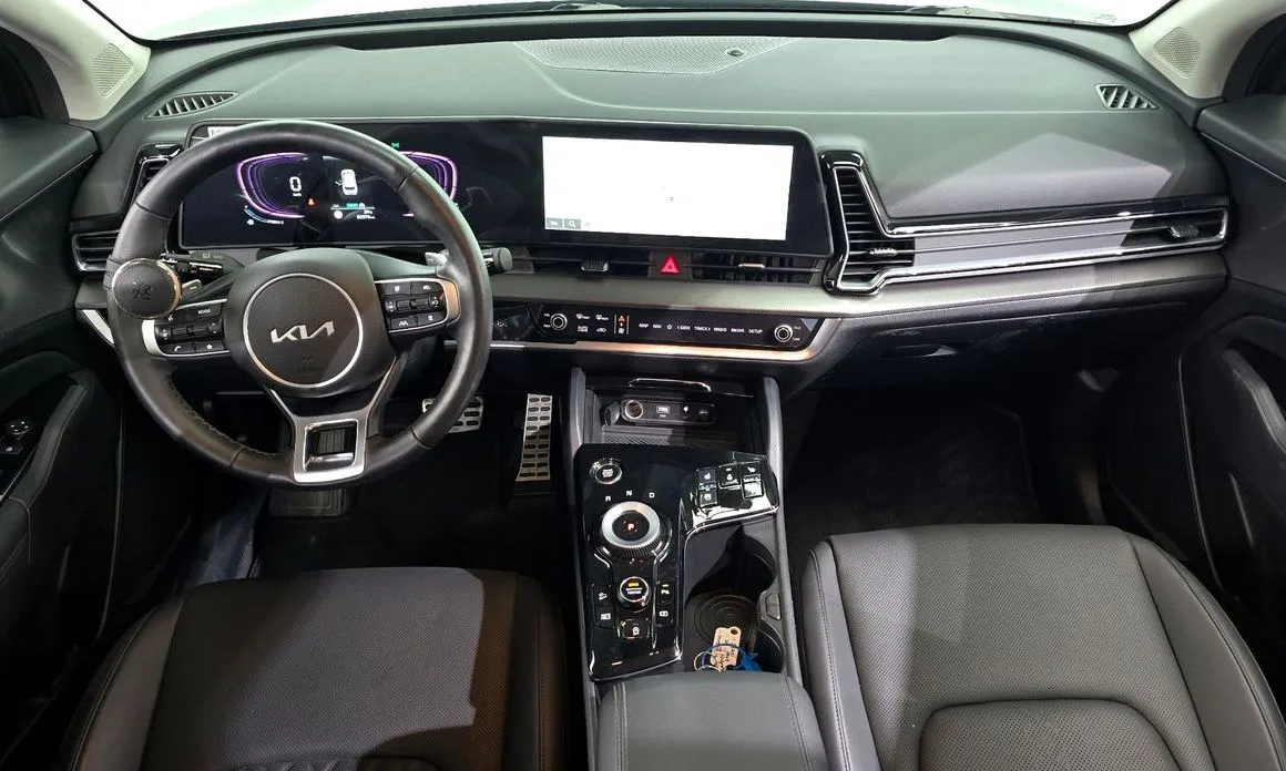 Kia Sportage — фото 7