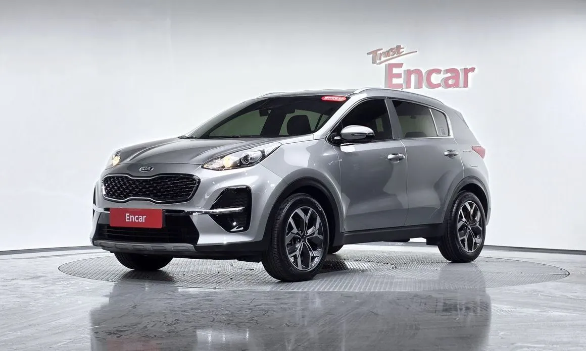 Kia Sportage — фото 1