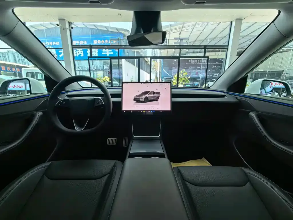 Tesla Model Y — фото 10