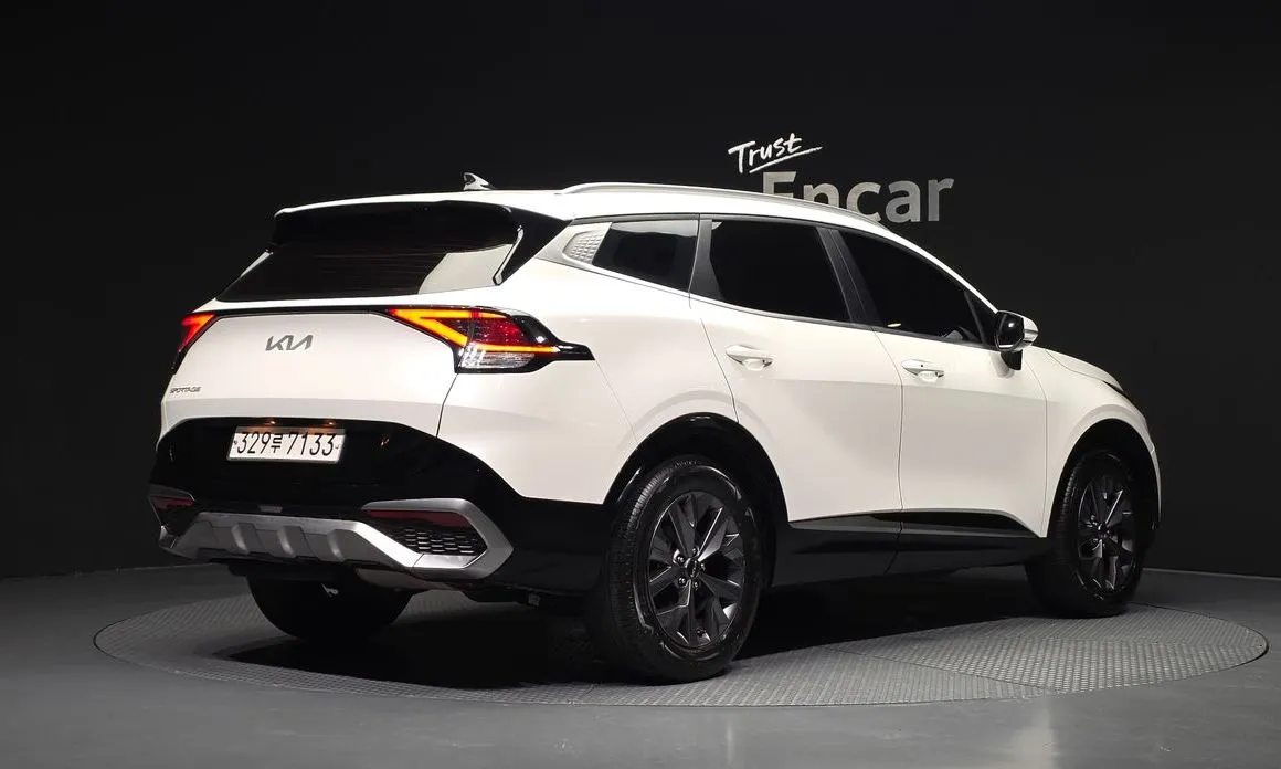 Kia Sportage — фото 7