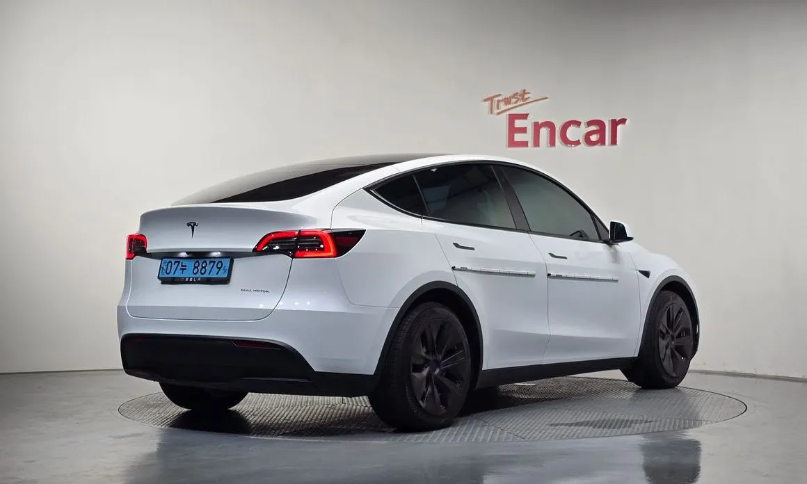 Tesla Model Y — фото 6