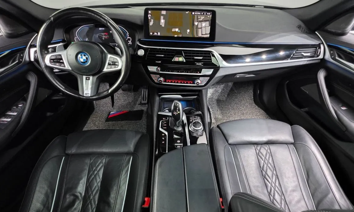 BMW 5-Series — фото 10
