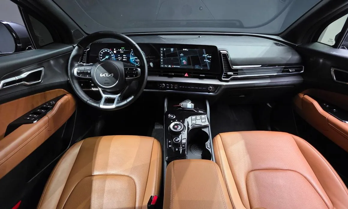 Kia Sportage — фото 9