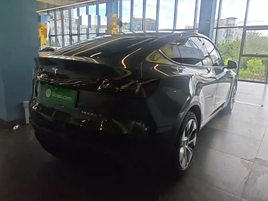 Tesla Model Y — фото 9