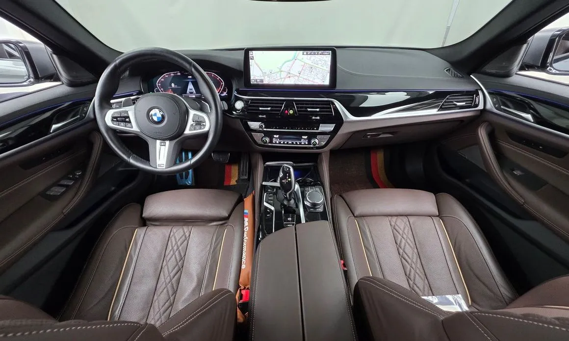 BMW 5-Series — фото 10