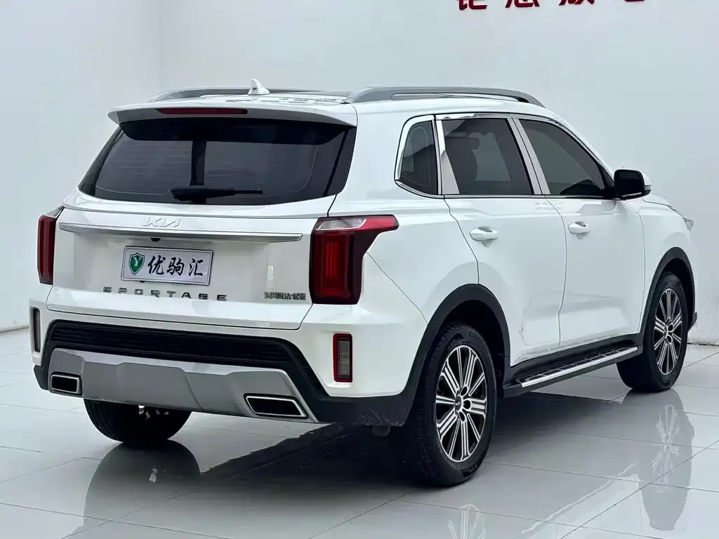Kia Sportage — фото 10