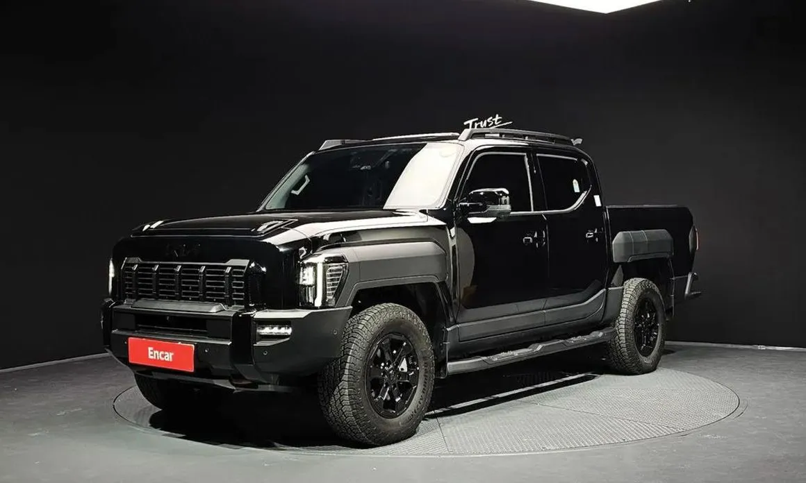 Kia Tasman — фото 1