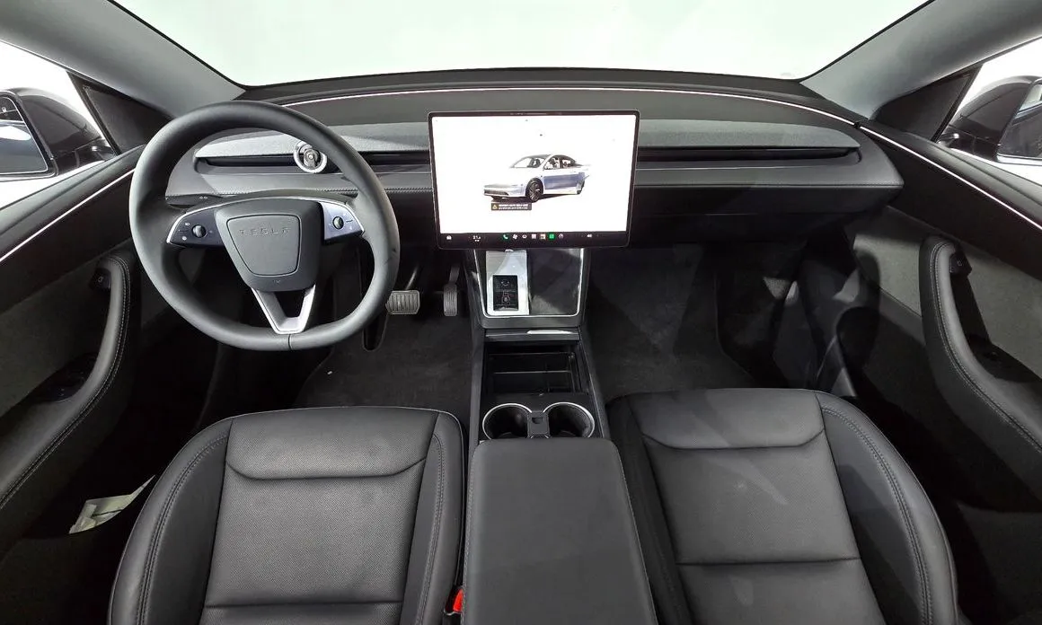 Tesla Model Y — фото 10