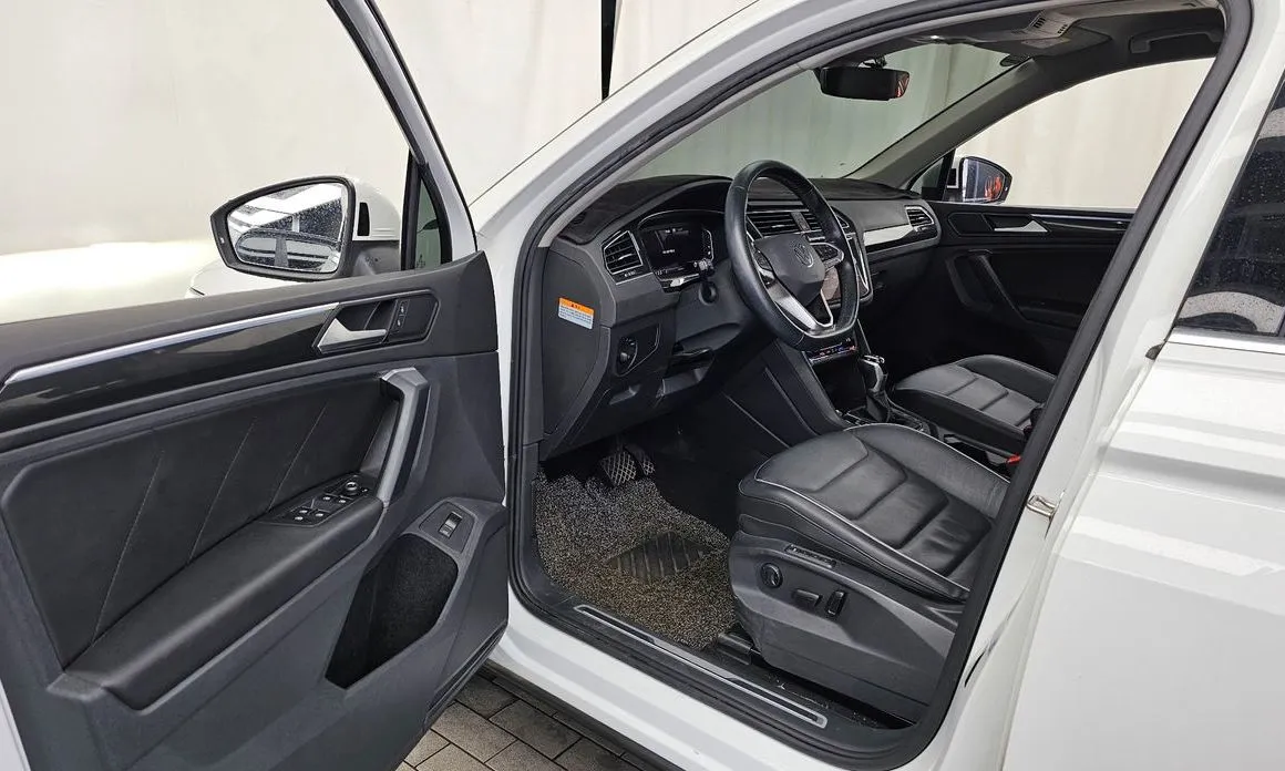 Volkswagen Tiguan — фото 10