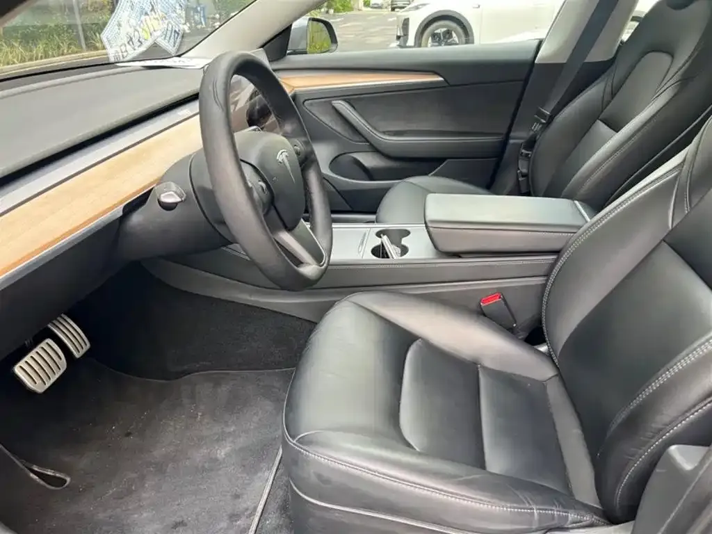 Tesla Model 3 — фото 4