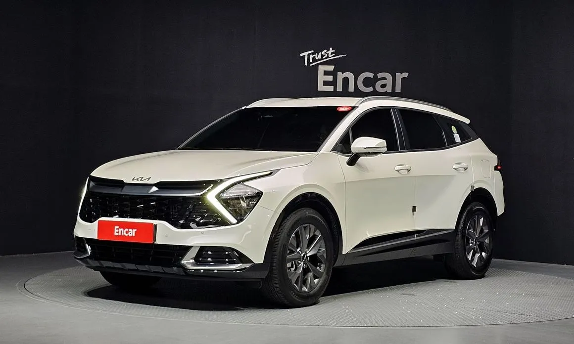 Kia Sportage — фото 1