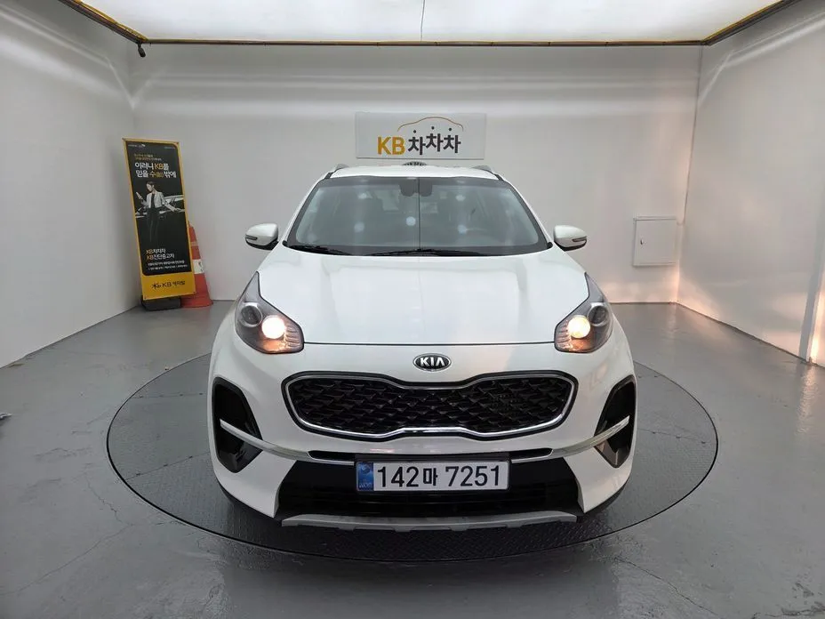 Kia Sportage — фото 1