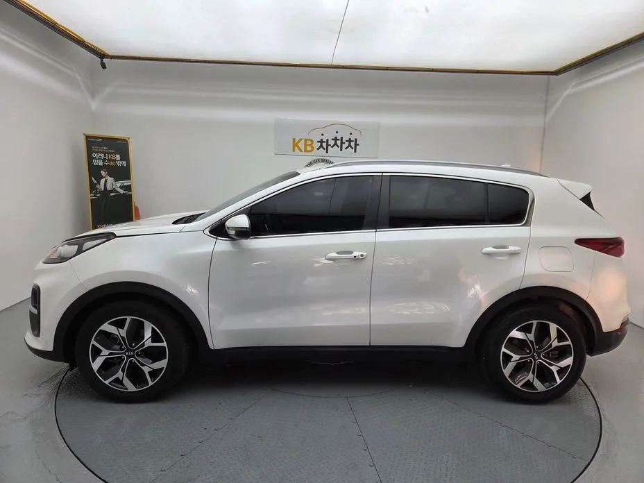 Kia Sportage — фото 9