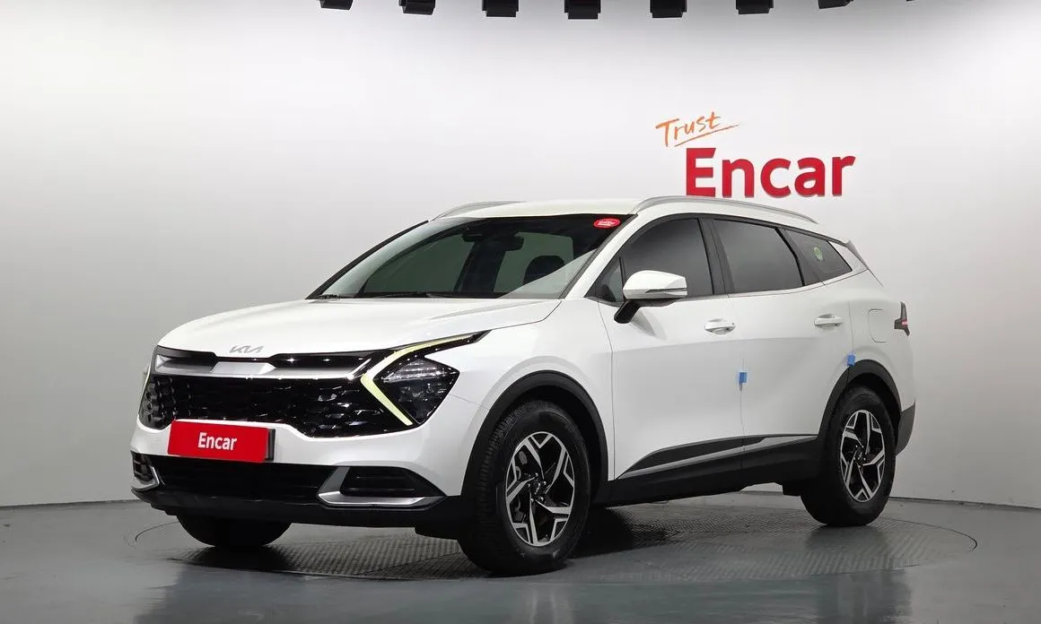 Kia Sportage — фото 1